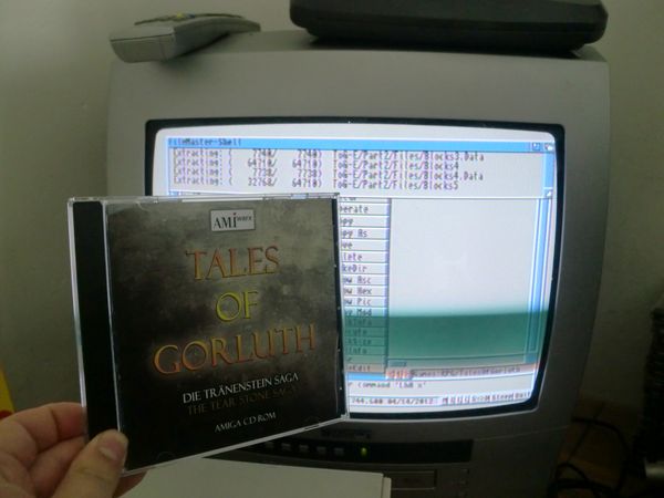 Installing Tales of Gorluth on my Amiga 1200. :) You can see Filemaster in the background uncompressing the .LHA archive.